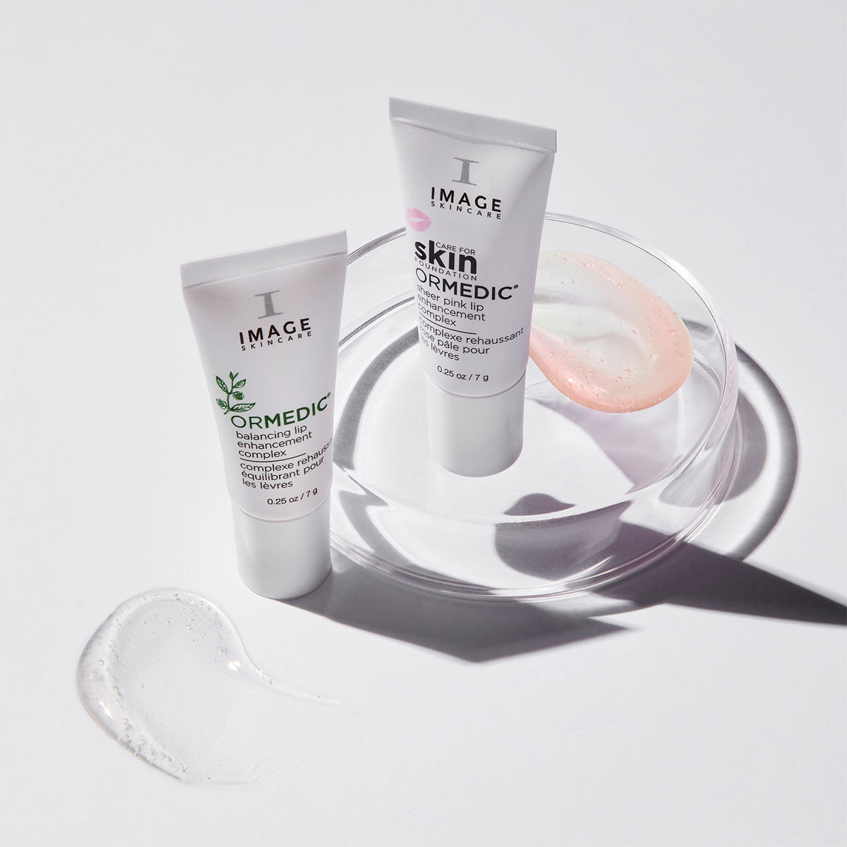 ORMEDIC lip enhancement complex in clear gel and sheer pink gel