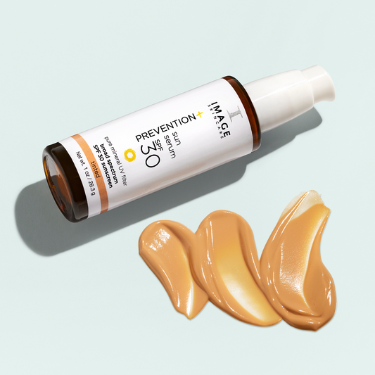 Image Skincare Prevention+ Serum SPF 30 with swatches on a light blue background